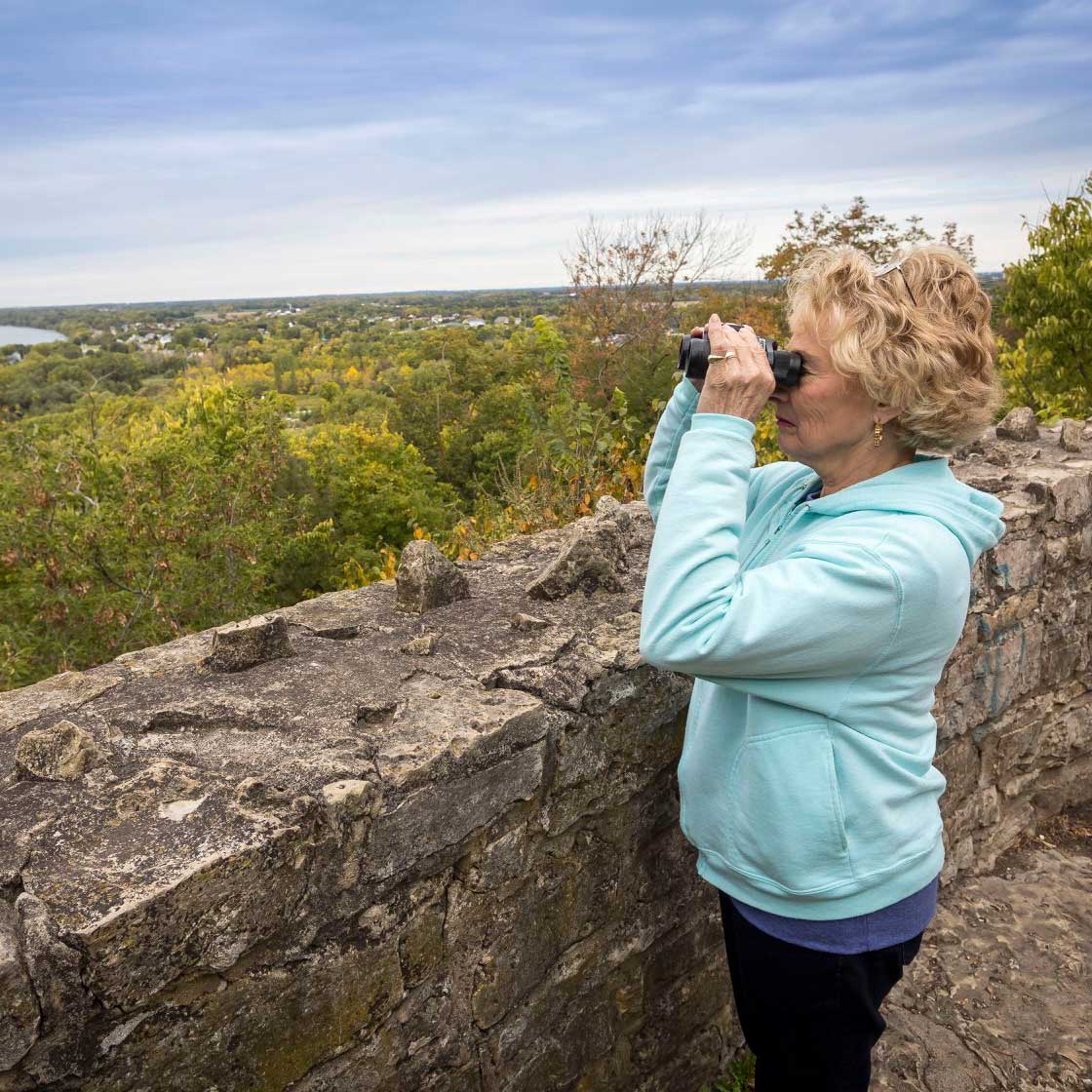 LIVE-HERE-photo woman with binoculars